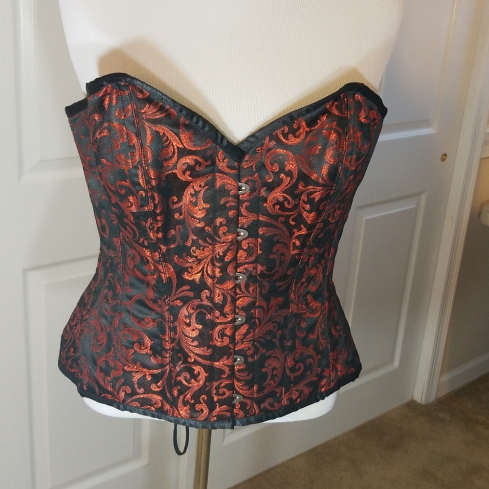 Red and black metal corset with sweetheart cut
